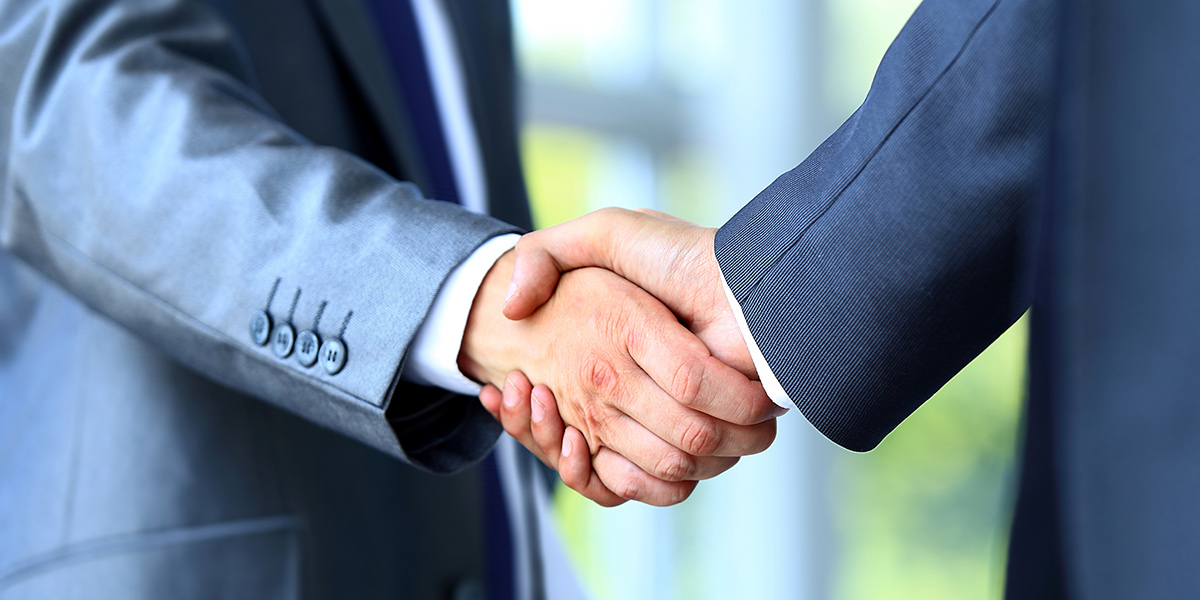 business people shaking hands