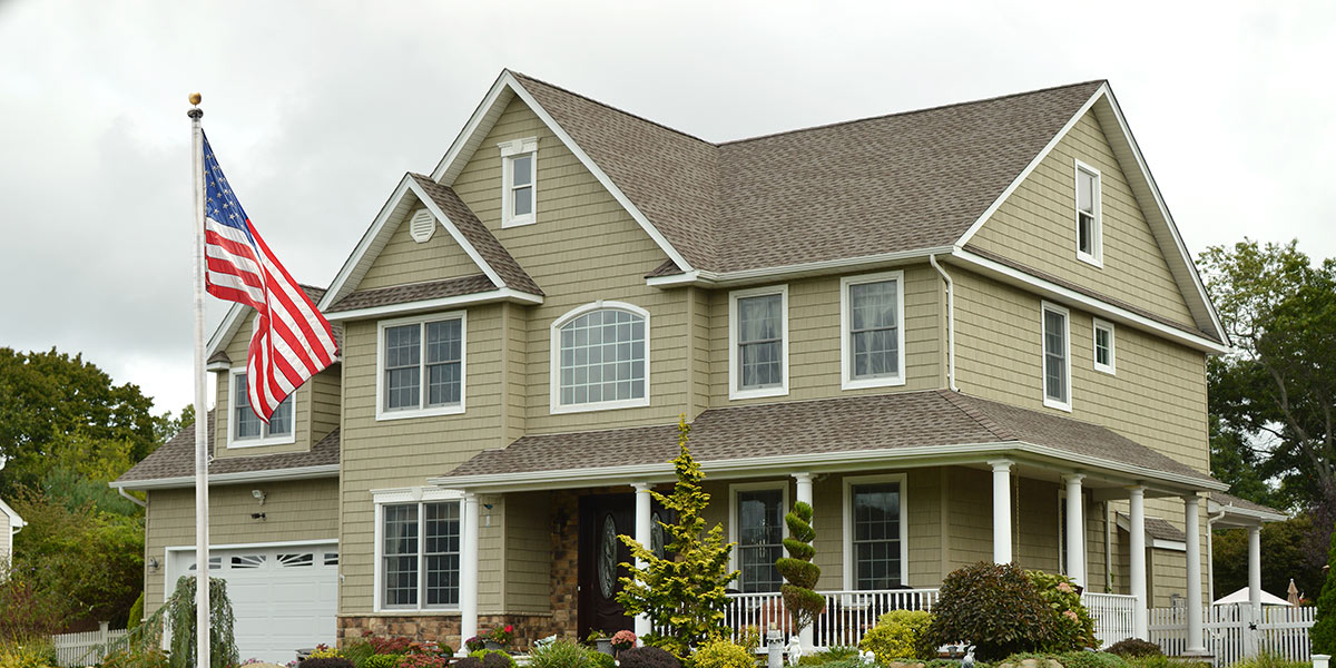 Suburban house with a flag