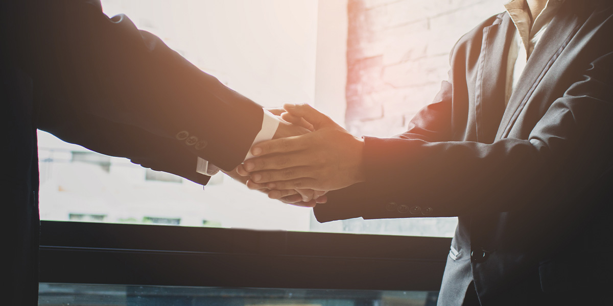 Business people shaking hands